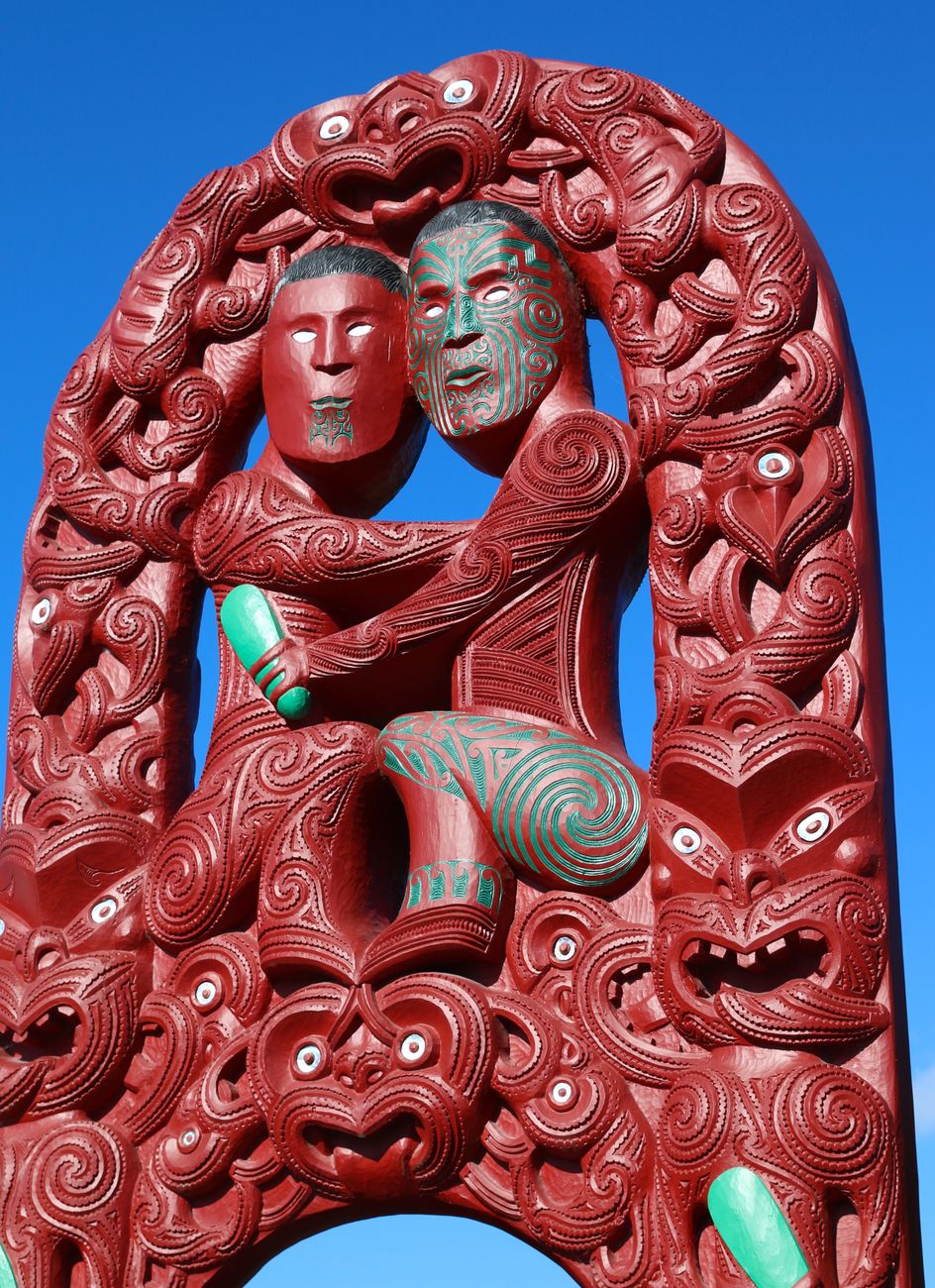 Traditional Maori carved meeting house Wharenui detail